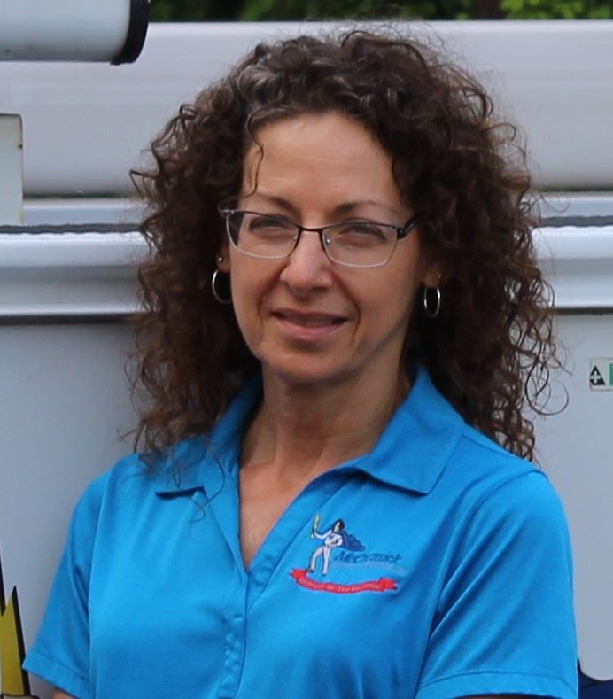 Karen working at her desk